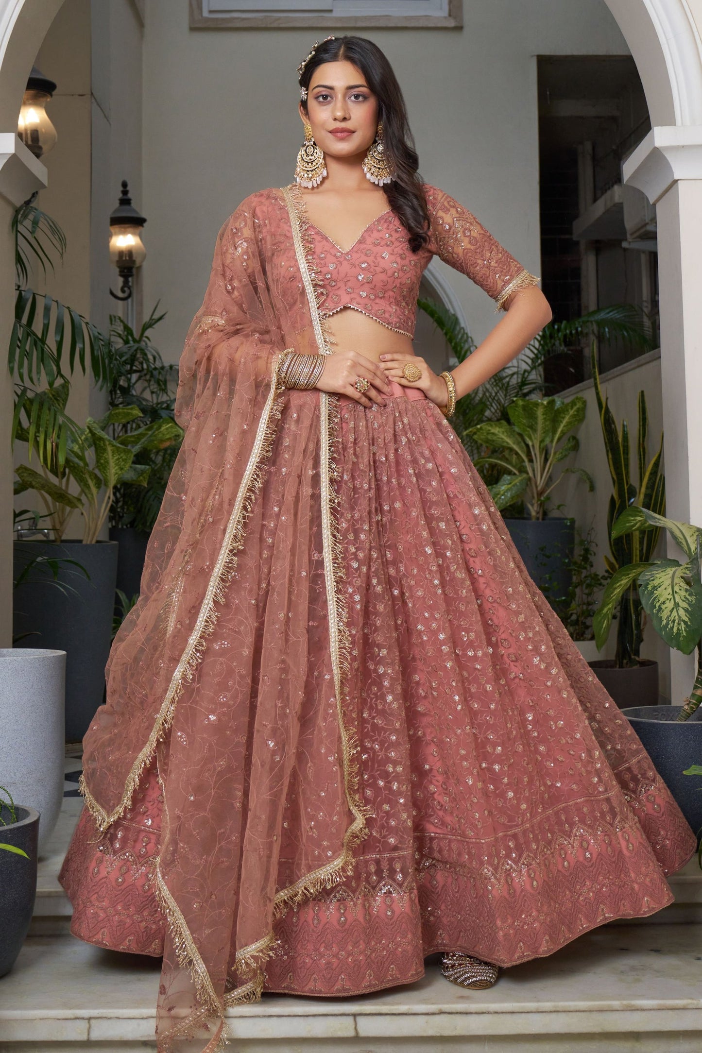 Peach Net Embroidered Lehenga Choli