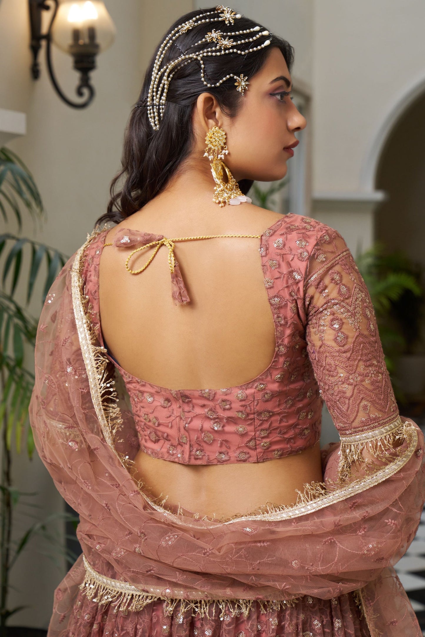 Peach Net Embroidered Lehenga Choli