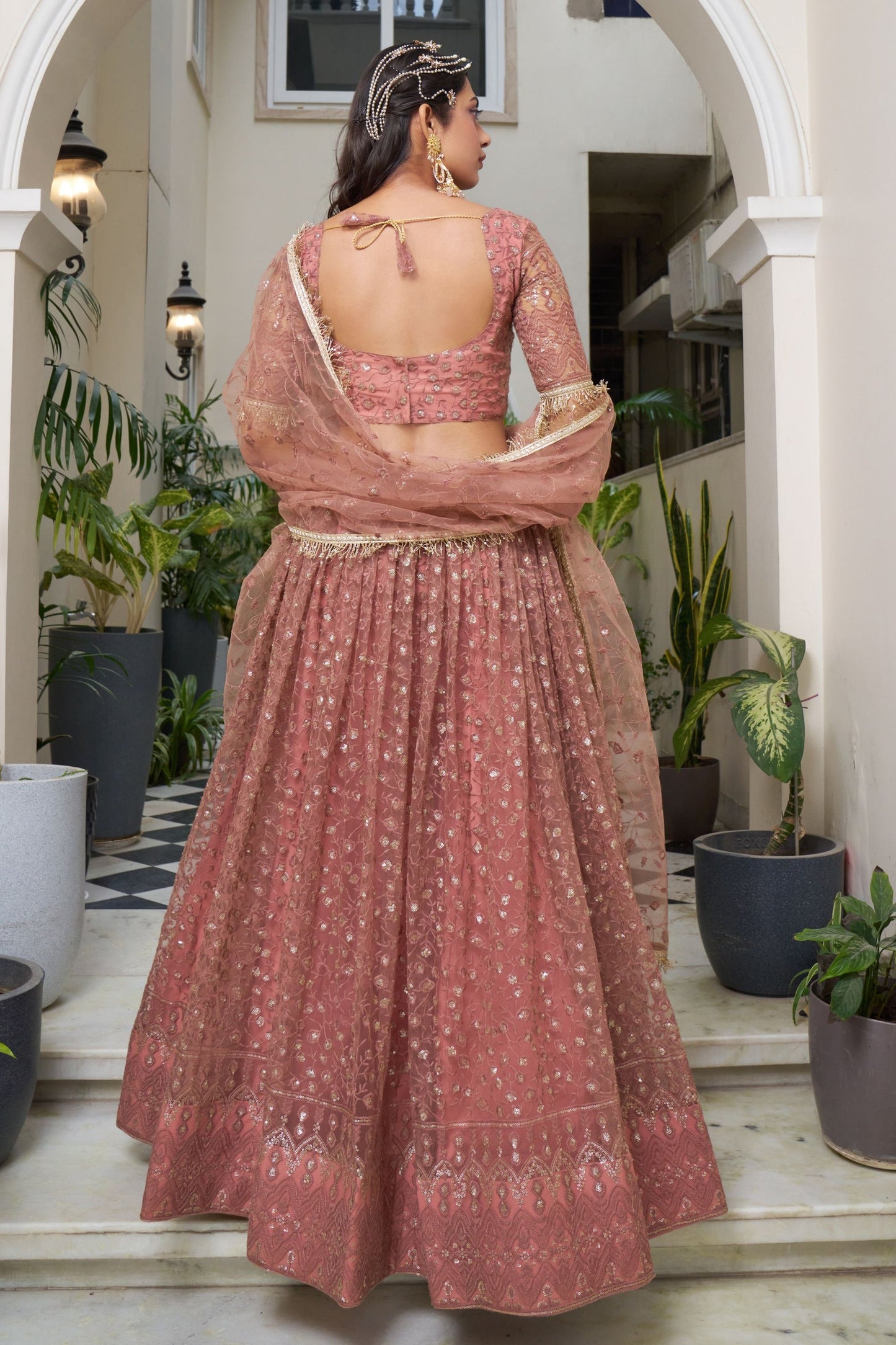 Peach Net Embroidered Lehenga Choli