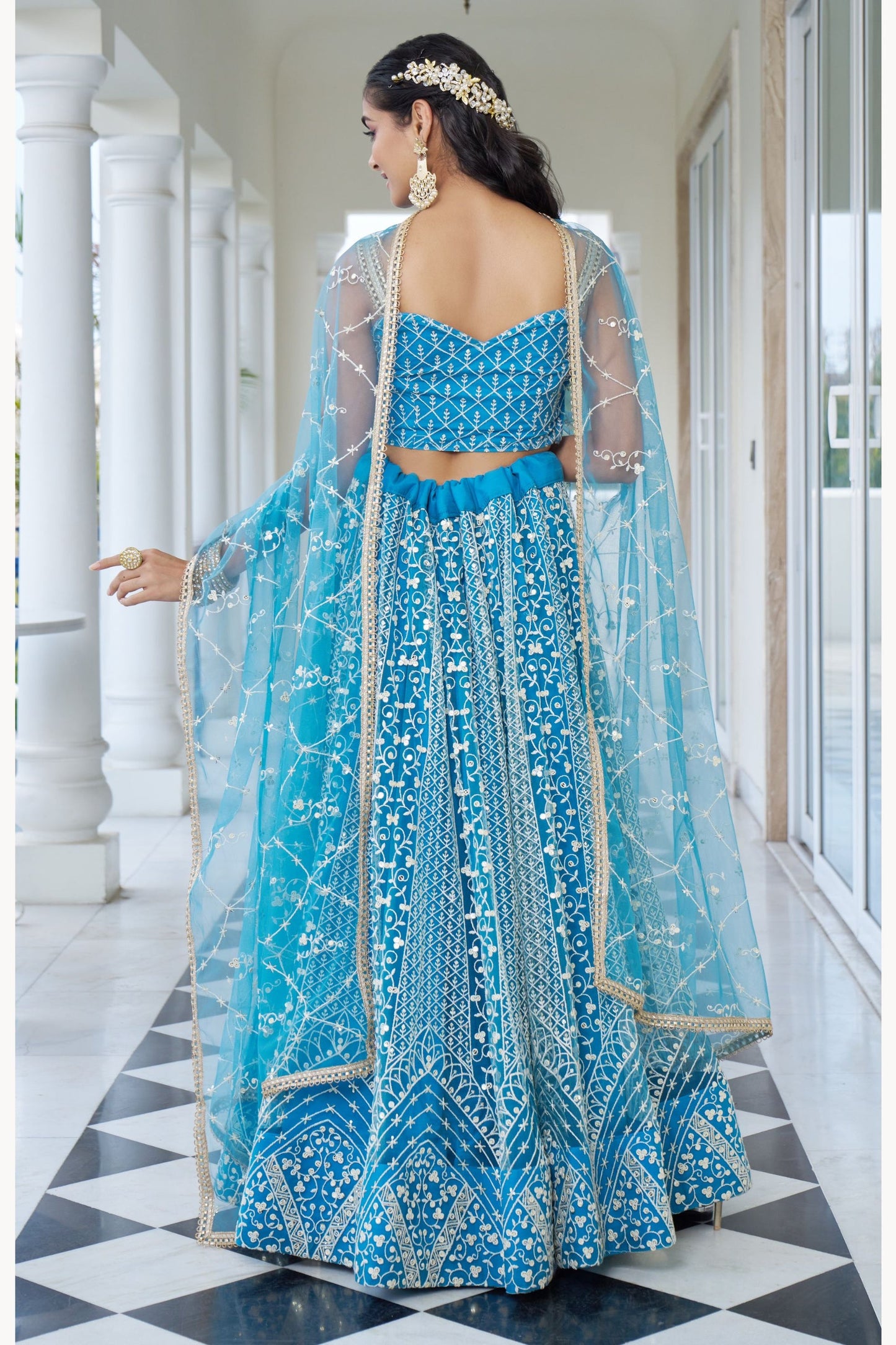 Turquoise Net Embroidered Lehenga Choli